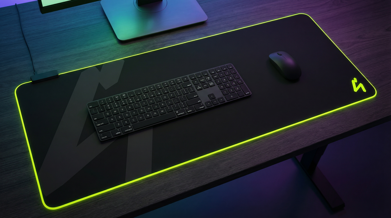 S4U extended gaming mousepad on a dark desk, stitched edges and smooth cloth surface with neon accent lighting